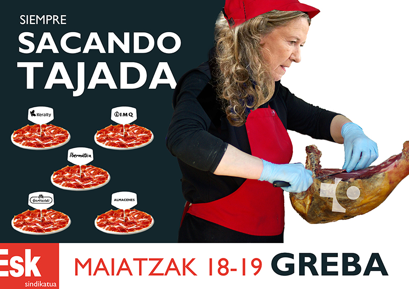 La consejera de Salud Gotzone Sagardui saca tajada de un jamón con el logotipo de Osakidetza